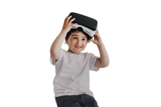 Little cheerful boy smiling wide taking off vr glasses, amazed after using virtual reality googles against transparent background. Playful Spanish boy at home using vr lenses for games. Kid, gamer