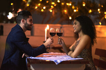 Love, wine and toast of couple on date for fine dining, restaurant or night valentine celebration...