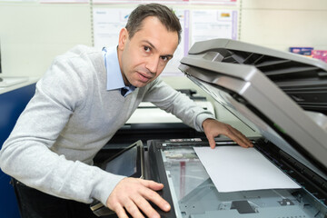 businessman making a photocopy