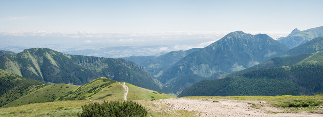 Naklejka na ściany i meble Nature alpine panorama with mountains, valley and low clouds, EU, Slovakia