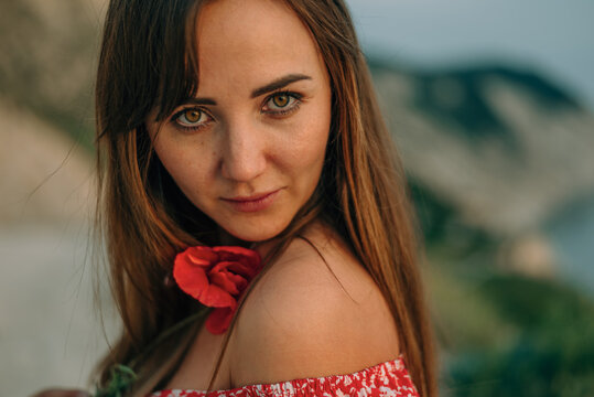 close-up portrait of a woman with a serious look