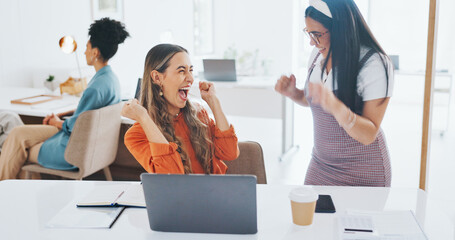 Fototapeta na wymiar Success, fist bump or happy employees with a handshake in celebration of digital marketing sales goals at office desk. Laptop, winner or excited women celebrate winning an online business deal at job