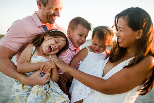 Fun Candid of Family of Five on Beach in San Diego at Sunset