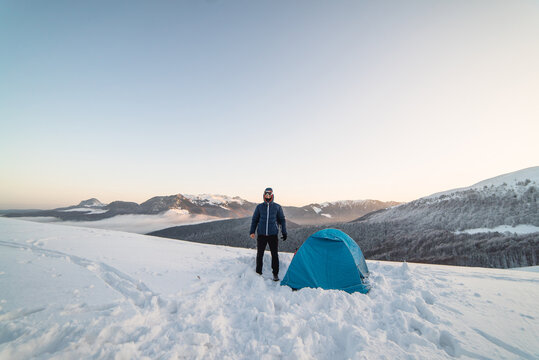Male Camping in Winter Cold Weather Temperature