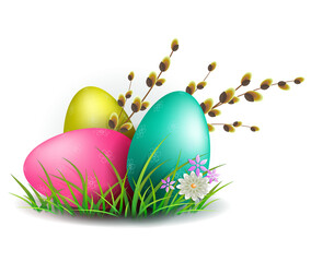 Easter eggs on green grass, flowers and willow branch.