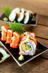 Sashimi, Sushi salmon & tuna sushi shrimp and wasabi on the wood table
