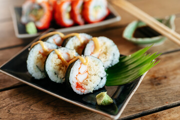 Sashimi, Sushi salmon & tuna sushi shrimp and wasabi on the wood table