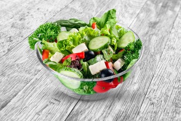 Fresh tasty salad with vegetables in bowl