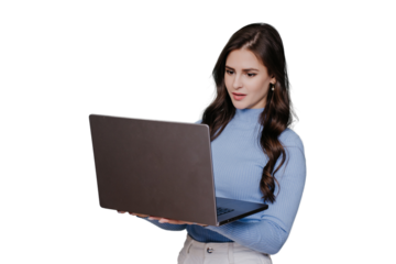 Adorable brunette hispanic businesswoman in casual holds new laptop looks at screen surprised by perfect quality standing against transparent background. Female manager works using computer. Mockup