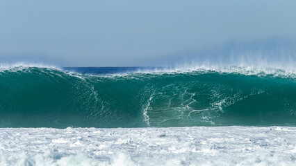 Ocean Wave Wall Sea Water Upright Crashing Breaking Power Towards Beach Coastline.