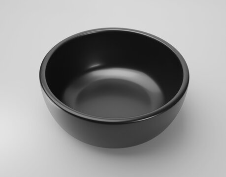 Empty black bowl on white background