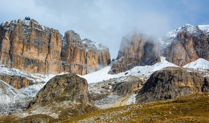 Fototapeta na wymiar the spring fog on the Pordoi Pass at over 2200 meters above sea level in the Dolomites