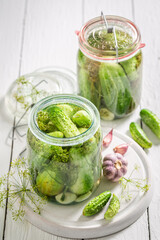 Natural and healthy pickled cucumber with garlic, salt and dill.