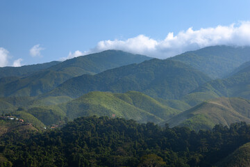 Fototapeta premium Mountains landscape with morning mist in Nan, Thailand.