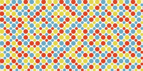 Grid of colored circles, large and small. Geometric seamless pattern for print, interior design, fabric, various surfaces.
