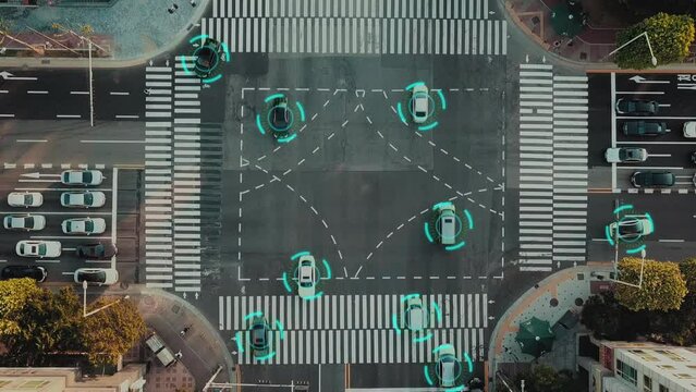 Self driving autonomous cars speeding through the crossroad with technology scanning their speed. Artificial intelligence traffic surveillance system to provide safe driving avoid traffic jams. 4K