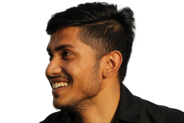 Smiling Indian young man side view face portrait close up on isolated transparent background.