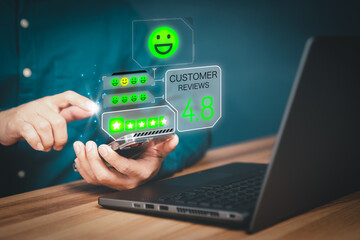 Man using a mobile phone or smartphone in give rating to service experience assessment on application. Online customer review satisfaction feedback survey and testimonial.