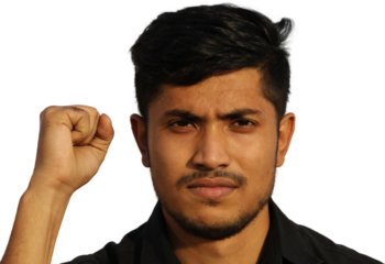 Risen up fist hand close view portrait of a young Indian man on isolated background.