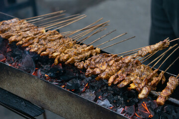 Chicken satay at the old market in Tangerang. Chicken satay is made from chicken and peanut sauce...