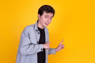 A Handsome guy on yellow background 