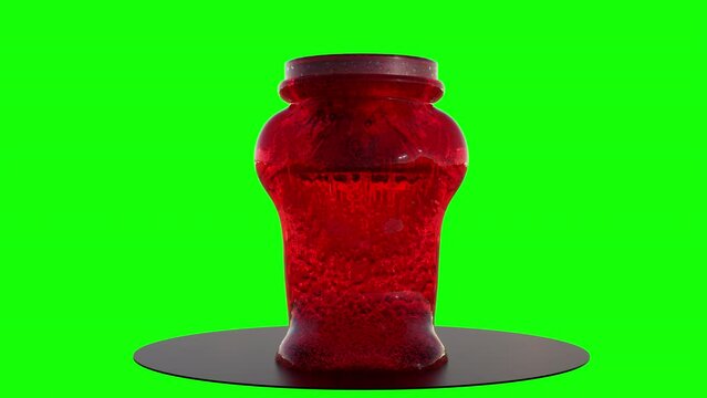 crushing of a gelatinous object. 3d animation of slime. slime crush on green background