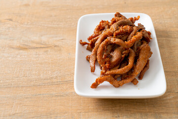 Sun-Dried Pork on white plate