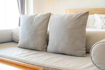comfortable pillows on end of bed sofa