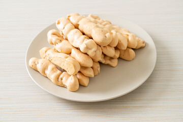 almonds meringue stick on plate