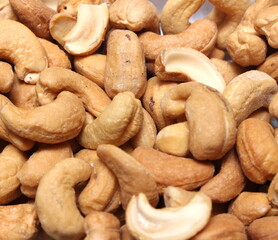 set of cashew nuts. cashew nuts covering the entire frame. food details. cashew nut texture.