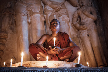 A buddhist Monk in a pagoda in Bagan Myanmar
