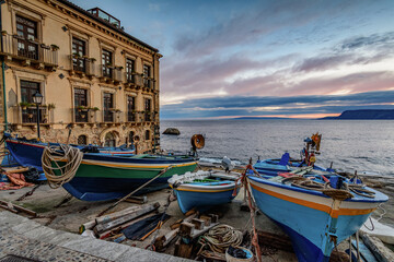 Fototapeta na wymiar The picturesque fishing hamlet of Chianalea at first morning lights, province of Reggio Calabria IT 