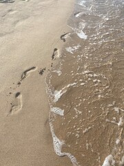 footprints on the beach