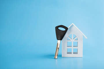 property insurance, real estate security, home protection, house and key on a blue background
