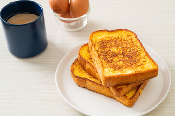 french toast on white plate