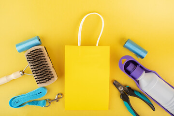 pet store background, pet accessories, dog and cat tools on a yellow background, copy space, top...