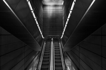 A metro station in Copenhagen at night, in black and white 