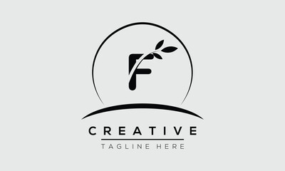 initial F circle letter logo design with leaf. F logo icon vector template.