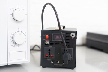 Obraz premium portable power station Effortlessly stay charged with a stylish charging station photo. Ideal for tech enthusiasts, busy professionals, and anyone who values convenience