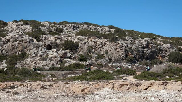 Quad bikes trip in Cape Greco National Forest Park in Cyprus, 4k video