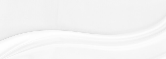 White gray satin texture that is white silver fabric silk panorama background with beautiful soft blur pattern natural.