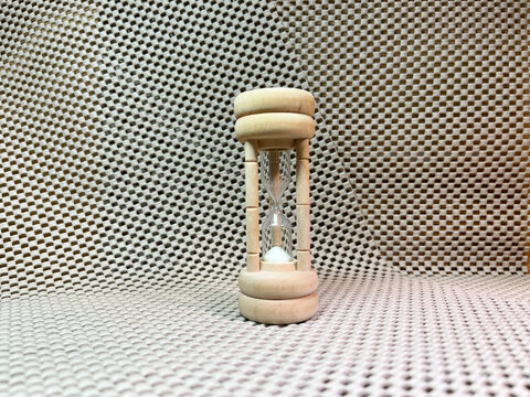 wooden hourglass and simple composition