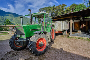 Old tractor used in the jungle for agricultural activities related to sugar cane.