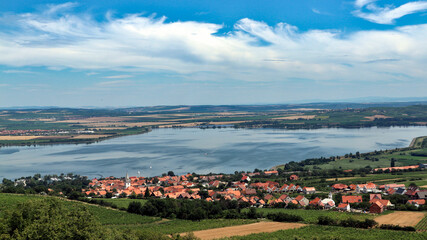 Fototapeta na wymiar A view to the large pond and village at Pavlov, South Moravia, Czech republic