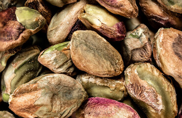 Macro photo of healthy food, toasted pistachios. Background and texture of dried fruit, series photo.