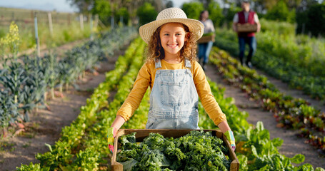Little girl, farm and agriculture in green harvest for sustainability, organic and production in...