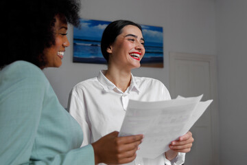 Young business coworkers smiling at the office