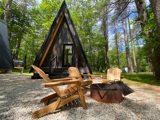 A Frame Cabin in The Woods - obrazy, fototapety, plakaty