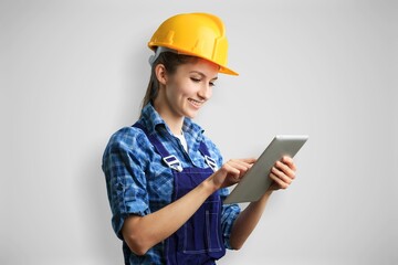 Young architect employee hold digital tablet