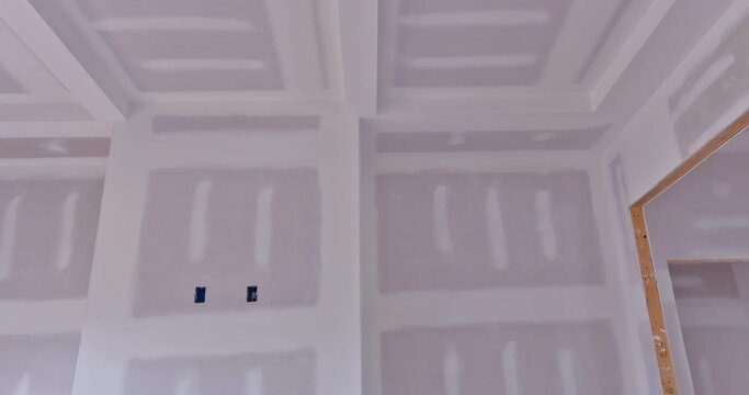 We have finished plastering drywalling of our new home under construction are preparing to paint wall that is still unfinished